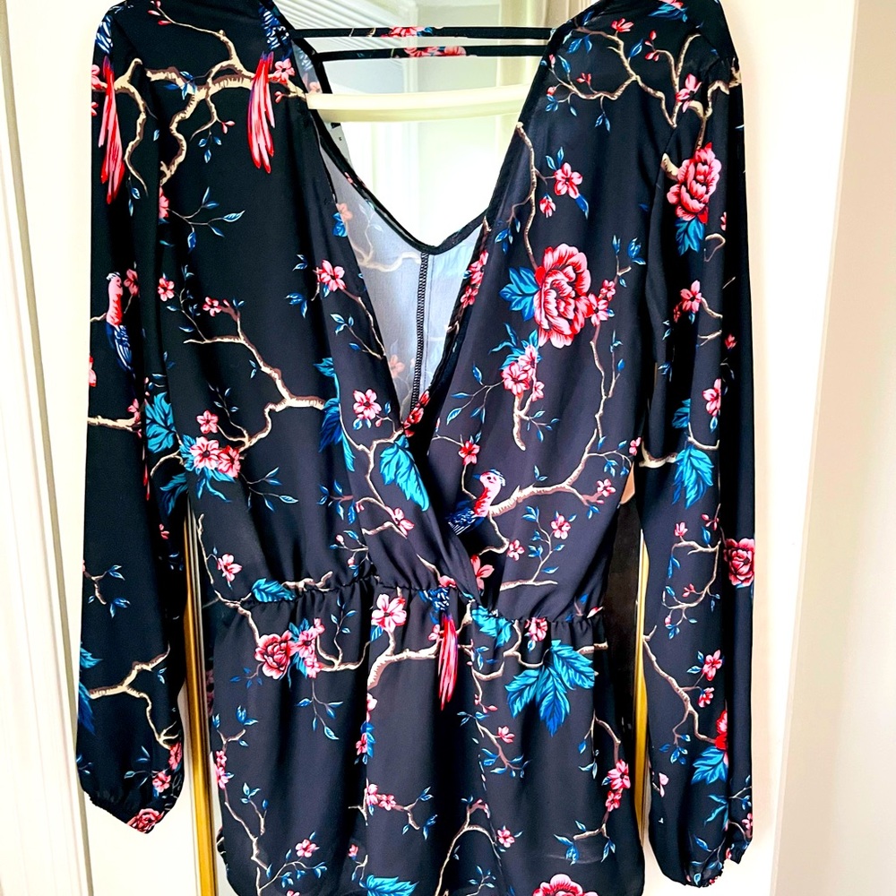 Draped open back blue floral blouse with cinched tie waist